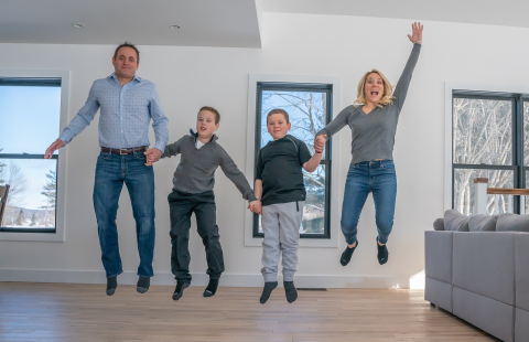 Family jumping in the air
