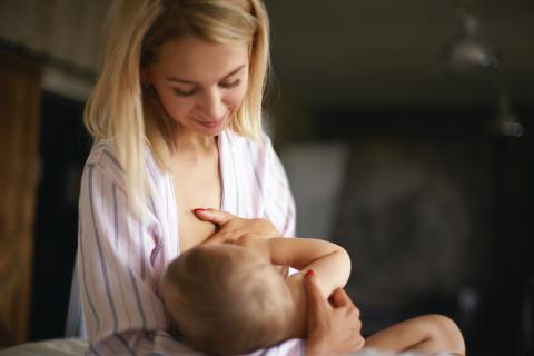 Mom breasting feeding infant