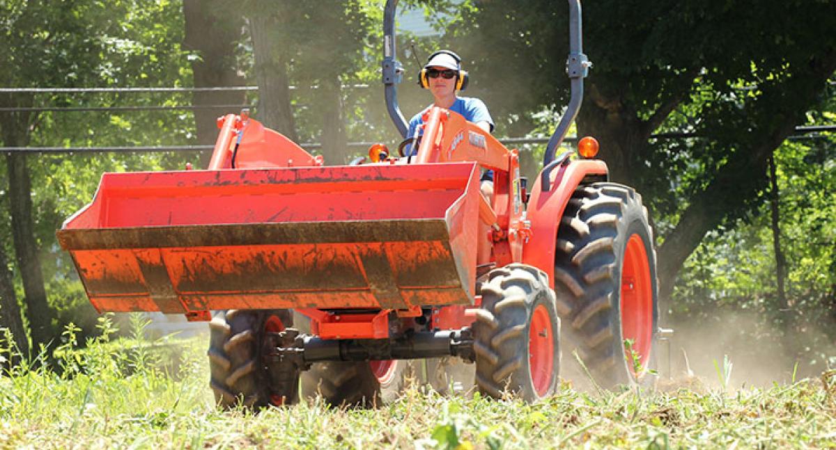 female farmer on tractor