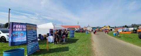 Picture of the local fair grounds with exhibit tents set up 