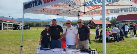 Radio station 97.3 Tent and staff interview a student