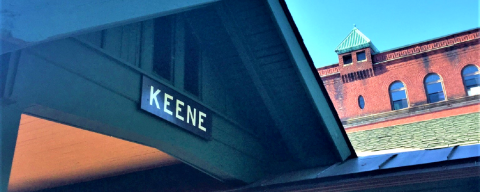 Building roof with a sign that says Keene