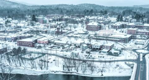 Aerial view of downtown Plymouth New Hamshire under winter snow