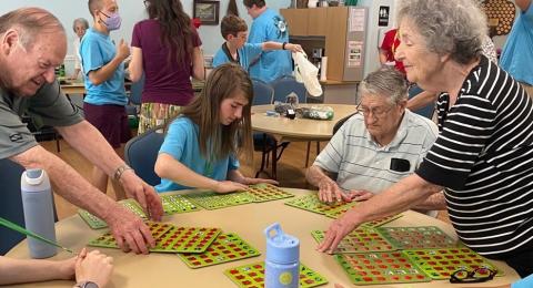 4-H Members doing an activity with seniors