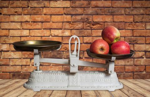apples on a balance scale
