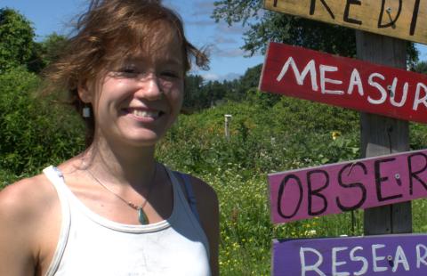 Teehan intern next to sign