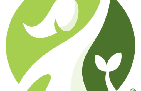 circle with graphic of a woman and a plant