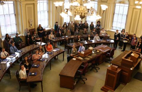 An overhead shot of N.H. 4-H members seated in the New Hampshire Senate's chambers.