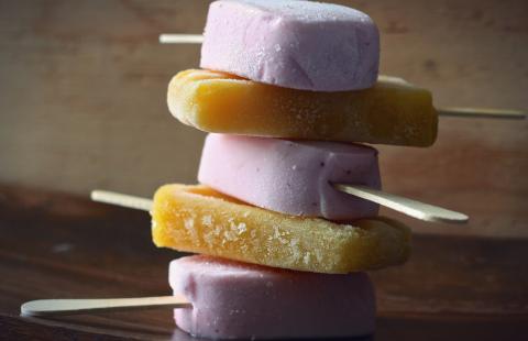 Stack of two different types of popsicles (juice pops).