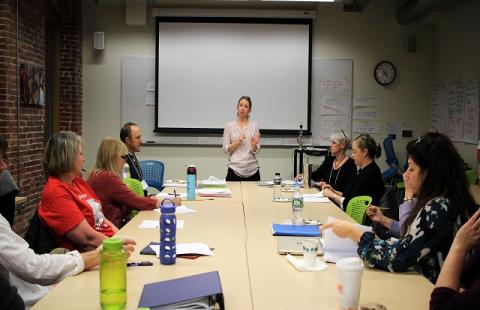 Sarah Grosvenor teaching a class of adults about STEM 