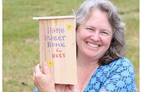 UNH Extension volunteer Kathy Schillemat of Nelson, NH created a special home for bees during the "Make a Bee Box" workshop at the Great Volunteer Getaway.