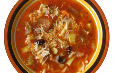 Top view of a bowl of minestrone soup
