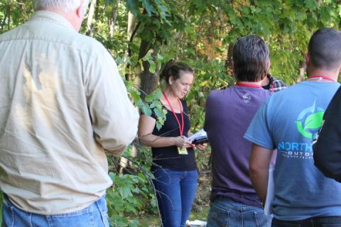 instructor and participants outdoors