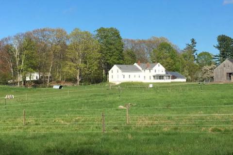 white house on a hill