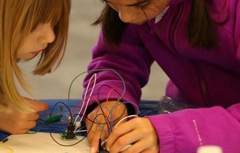 4-H youth working on a project