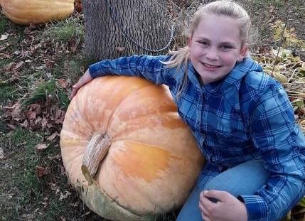 4-H'er growing pumpkin