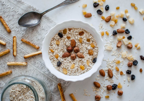 bowl of oats and nuts and fruits