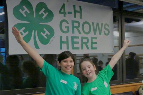 Two girls smiling and enjoying being part of 4-H.