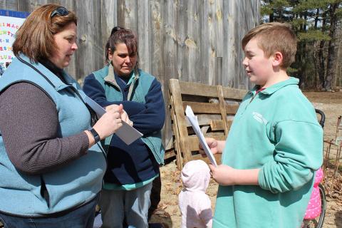 4-H club volunteer at club meeting