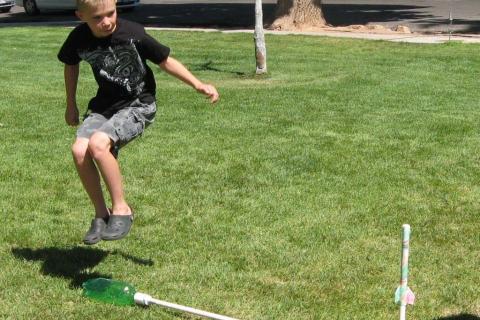 youth launching stomp rocket