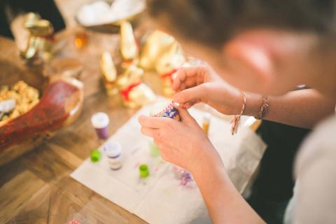 A child working on a craft project.