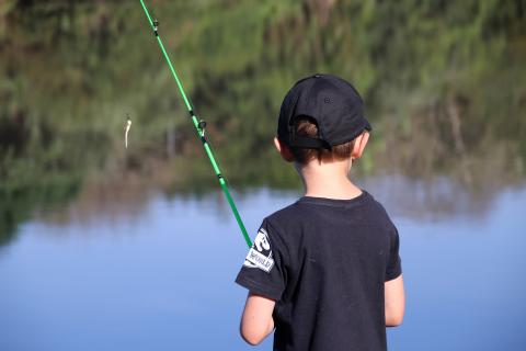 A boy fishing.