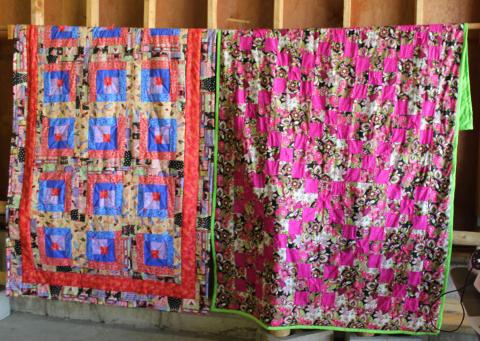 Picture of two handmade quilts.