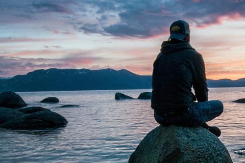 youth contemplating at seaside