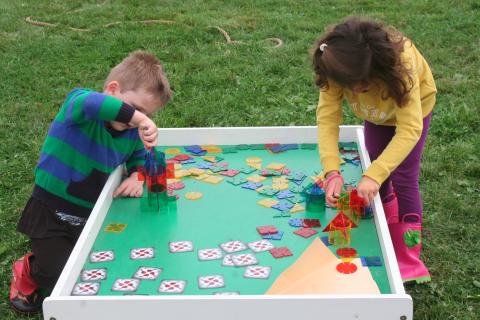 Kids playing with an astro game
