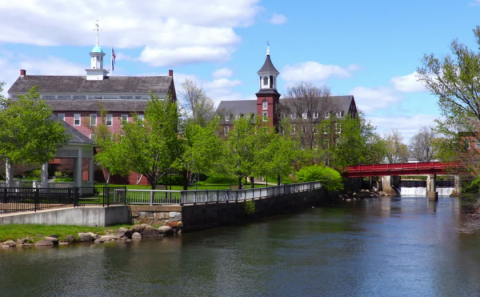 Laconia NH, gazebo on river with bridge