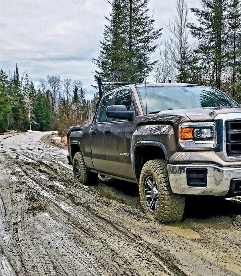 Muddy road with truck