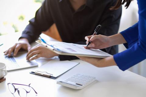 Two people working on a project