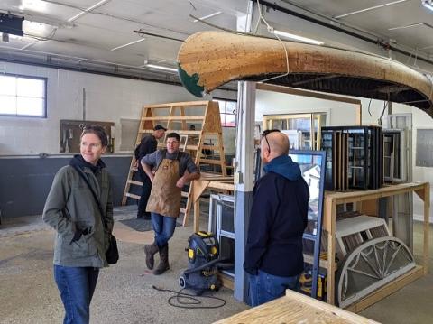 people in a window restoration shop