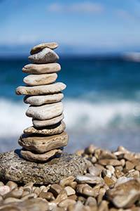 ocean seashore stacked rocks