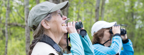 women birding with binoculars