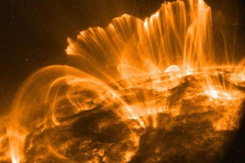 A large bright orange solar storm of plasma CREDIT: NASA/GSFC/TRACE