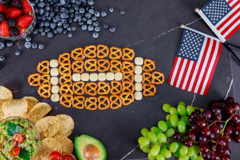 Superbowl Party Food with a football made out of pretzels.