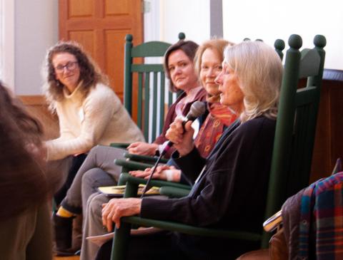 four women speaking on a panel