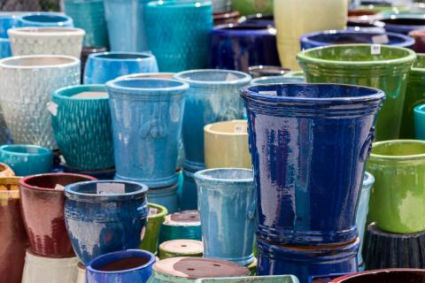 Ceramic pots that are painted bright colors