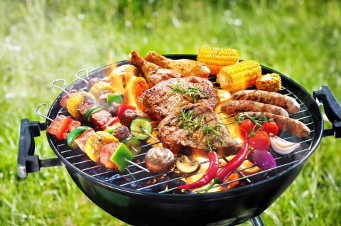 Grilling a variety of meats and vegetables.