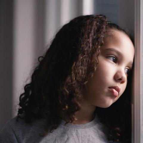 young female reflecting