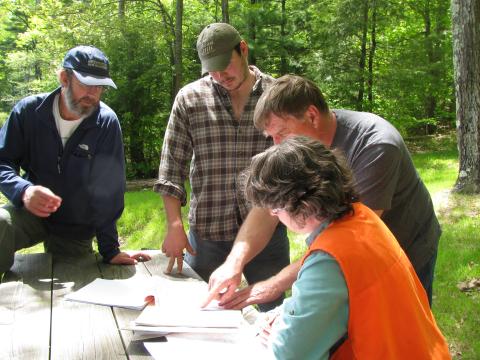 Caring for your land, participants review site map and plan