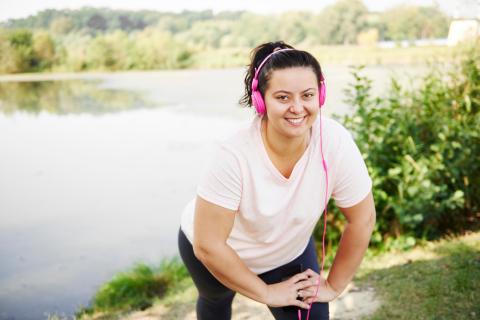 Woman stretching while getting ready to take a walk.