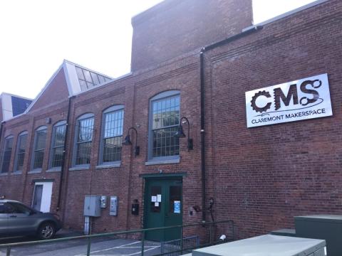 Exterior of the Clarement MakerSpace building, a large historic brick structure