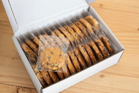 individually wrapped chocolate chip cookies in a white box