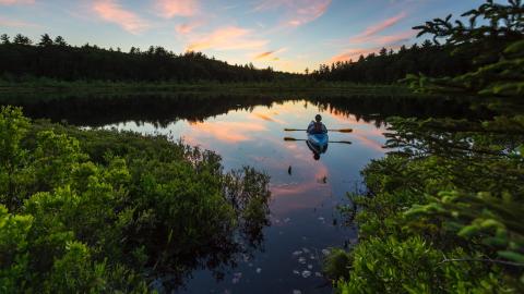 Kayaker at sunset