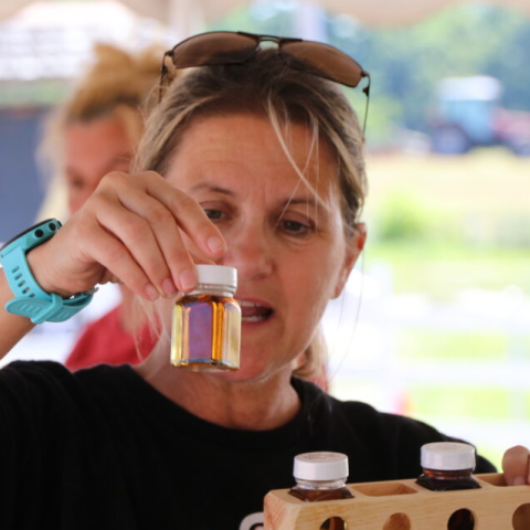 teacher with maple syrup samples