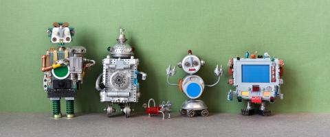 homemade robot crafts in a line