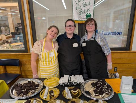 Youth at foods festival table