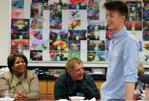 4-H student talks with legislators